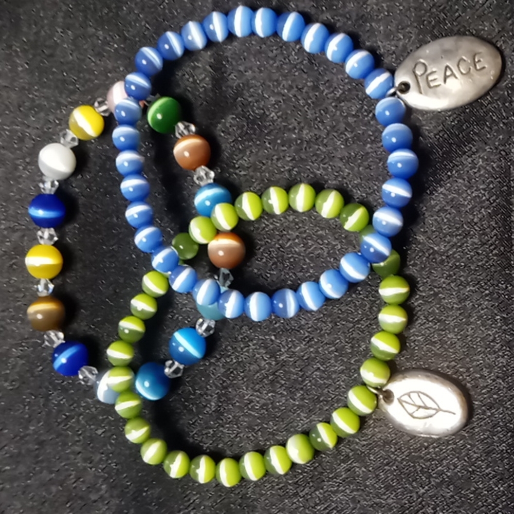 3 Cats eye quartz expandable bracelets green ,blue , multicolor.
